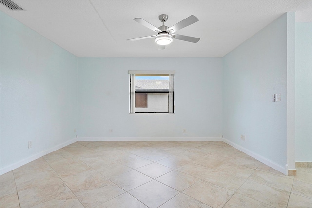 empty room featuring ceiling fan