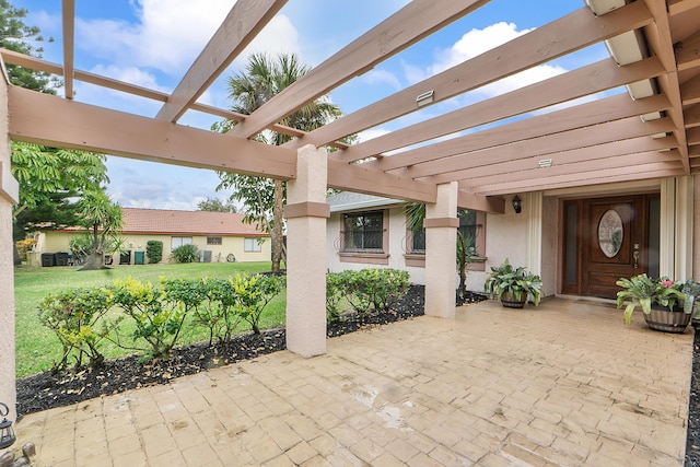 view of patio featuring a pergola