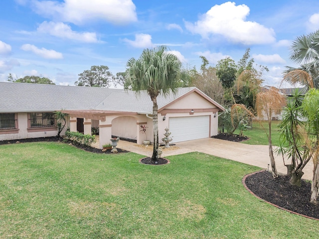 ranch-style home with a front yard and a garage