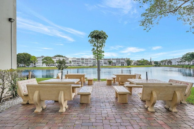 view of patio / terrace with a water view