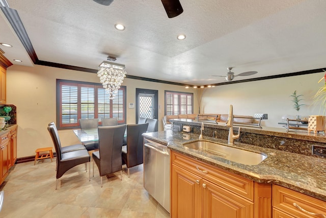 kitchen with dishwasher, ornamental molding, stone countertops, and sink