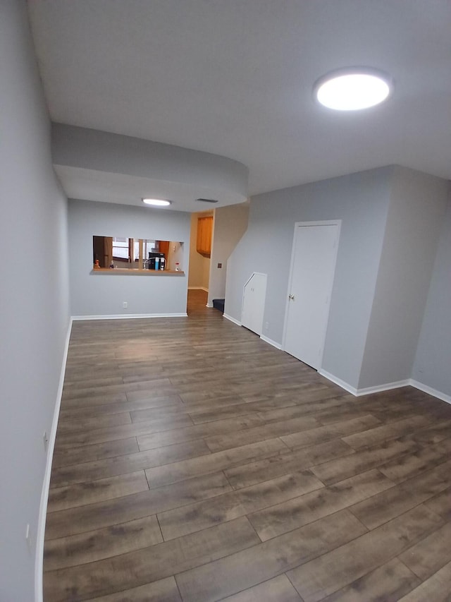 unfurnished living room featuring hardwood / wood-style floors