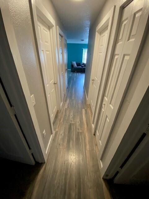 hall featuring dark hardwood / wood-style flooring