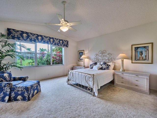 bedroom with light carpet, a textured ceiling, ceiling fan, and lofted ceiling