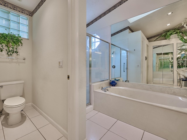 bathroom featuring tile patterned floors, toilet, and independent shower and bath