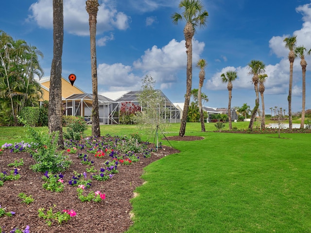 view of yard featuring a lanai