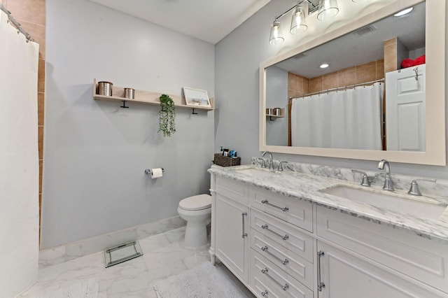 bathroom featuring vanity, toilet, and a shower with shower curtain