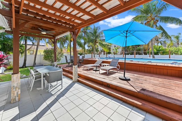 view of patio / terrace with a fenced in pool and a pergola