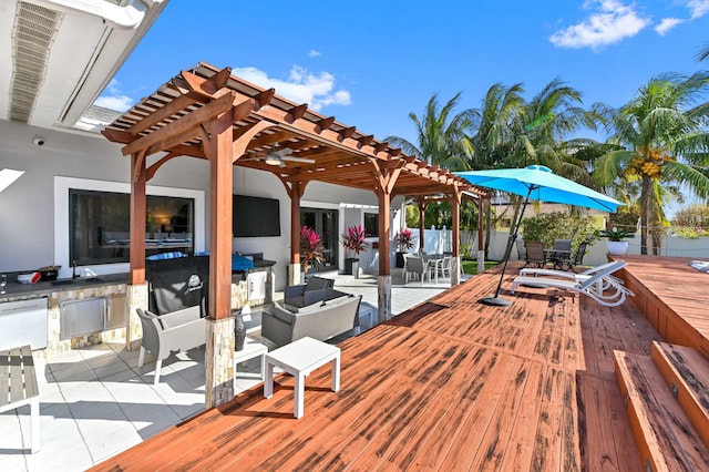 wooden terrace featuring outdoor lounge area and a pergola