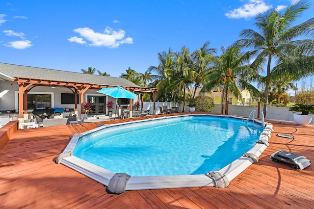 view of pool featuring a wooden deck