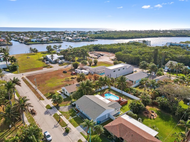 bird's eye view with a water view