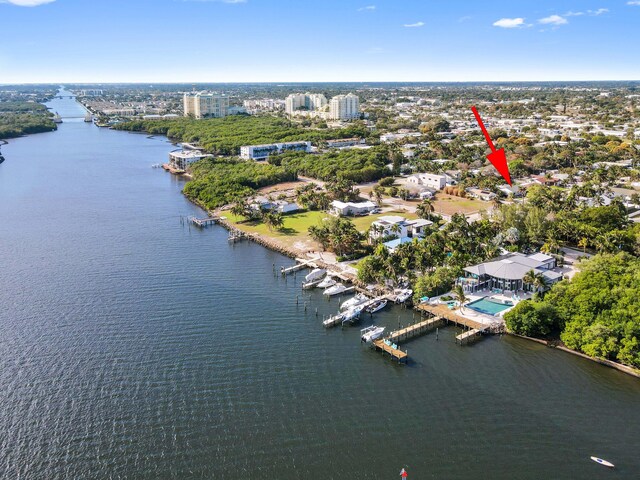 birds eye view of property featuring a water view