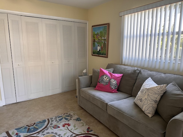 living room with light tile patterned flooring