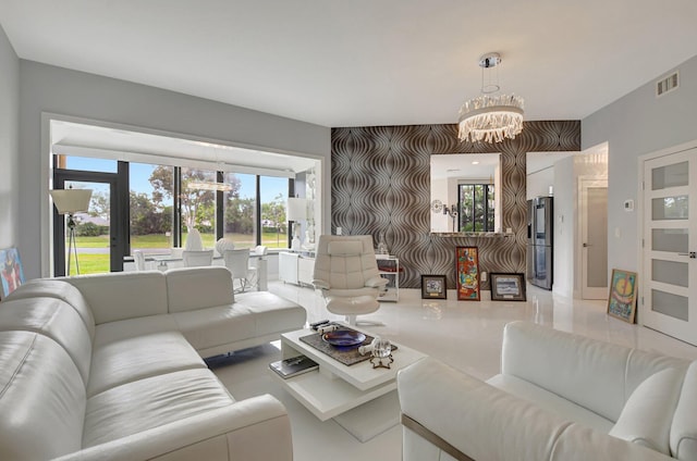 living room featuring a notable chandelier