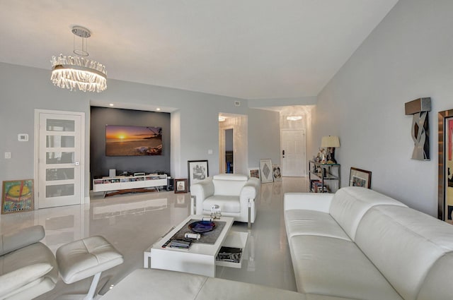 living room with an inviting chandelier