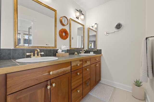 bathroom with decorative backsplash, vanity, and tile patterned flooring