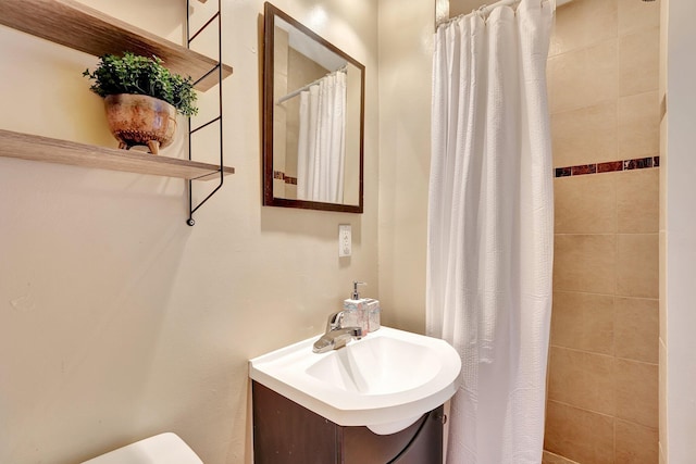 bathroom with sink and walk in shower