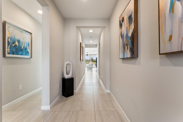 hallway with light tile patterned floors