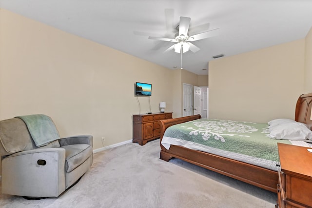 bedroom with ceiling fan and light colored carpet