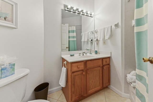 bathroom with toilet, tile patterned flooring, a shower with curtain, and vanity