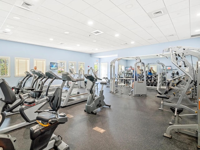 workout area with a drop ceiling