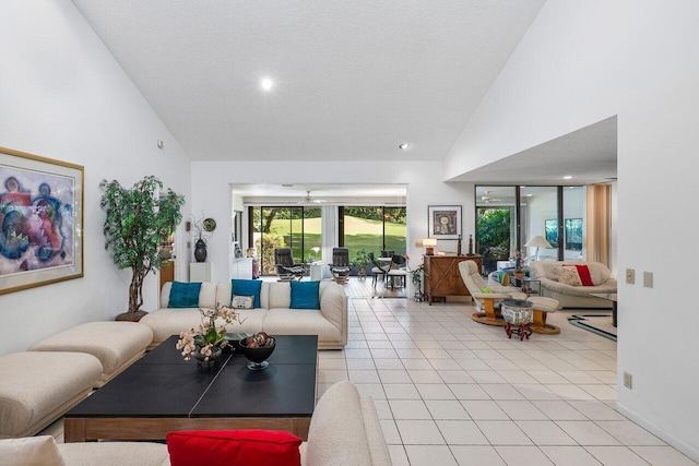 living room featuring light tile patterned floors, a textured ceiling, and high vaulted ceiling