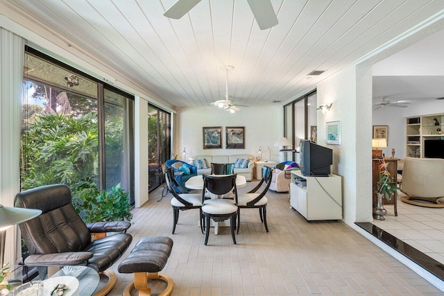 dining room with wood ceiling