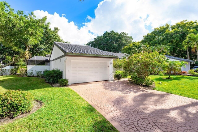 garage featuring a yard