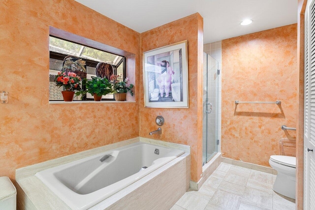 bathroom with tile patterned floors, toilet, and shower with separate bathtub