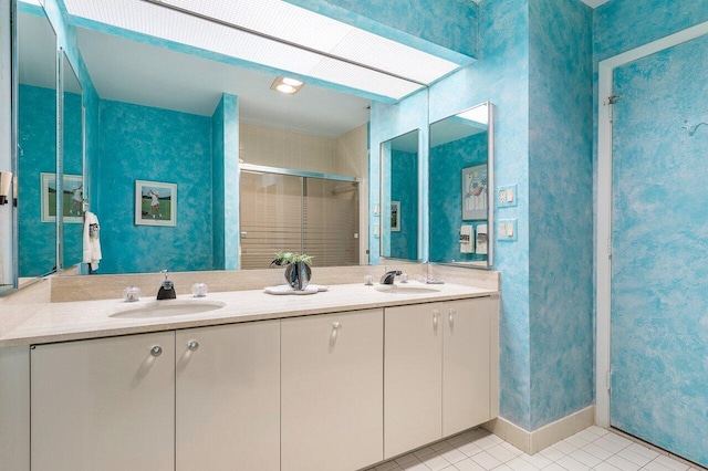 bathroom featuring vanity and tile patterned floors