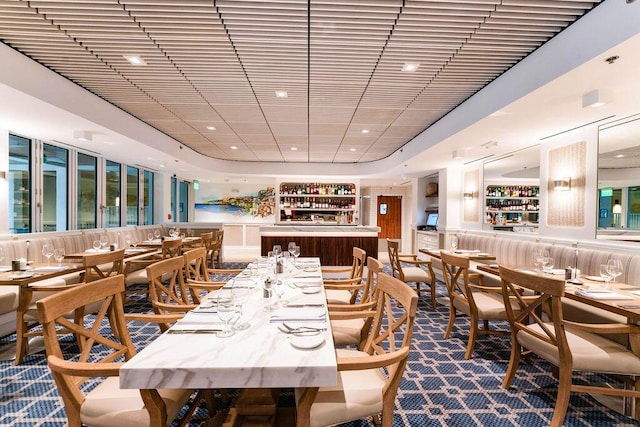 view of carpeted dining area