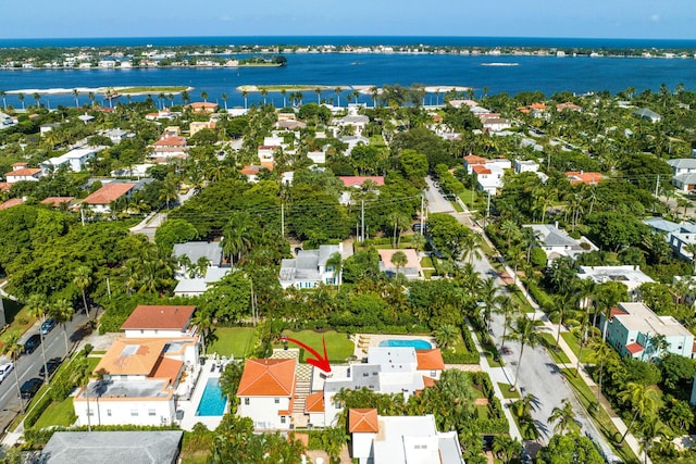 aerial view featuring a water view and a residential view