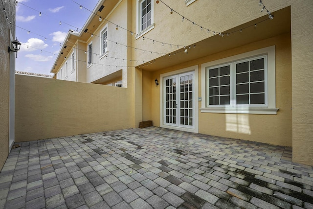 view of patio featuring french doors