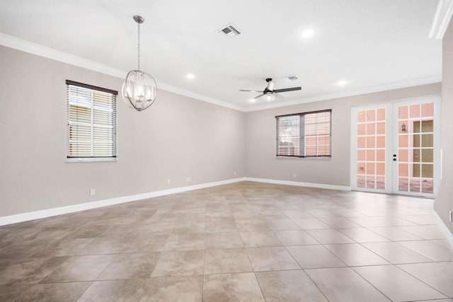 tiled empty room with ceiling fan with notable chandelier, crown molding, and french doors