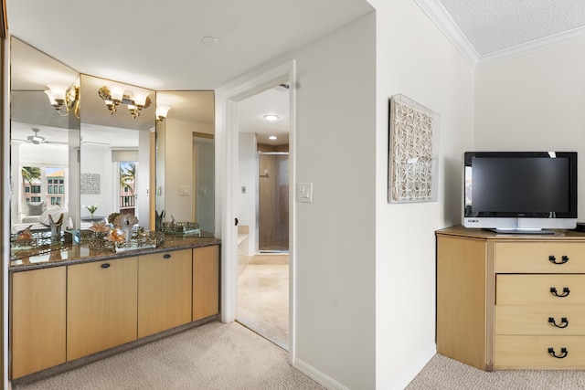 bathroom featuring crown molding, a chandelier, a textured ceiling, a shower with door, and vanity