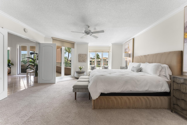 carpeted bedroom with access to exterior, a textured ceiling, ceiling fan, and crown molding