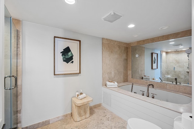 bathroom with toilet and separate shower and tub