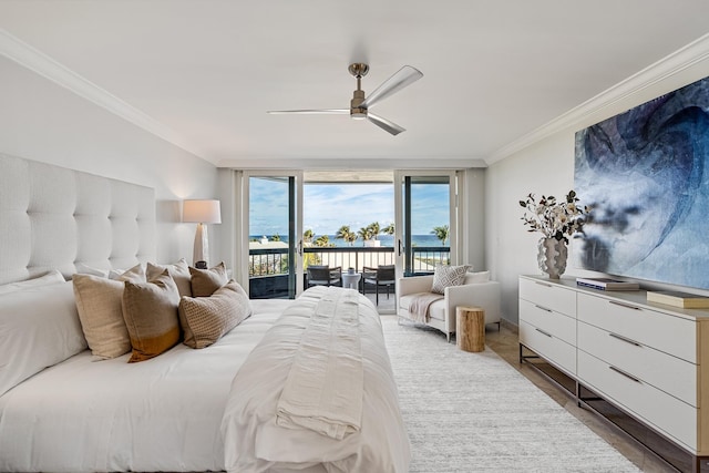 bedroom featuring floor to ceiling windows, ceiling fan, crown molding, wood-type flooring, and access to outside