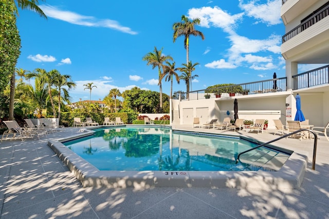 view of swimming pool featuring a patio area