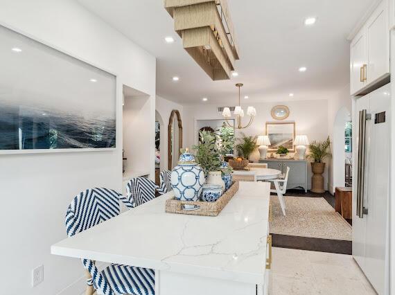 dining area featuring a notable chandelier