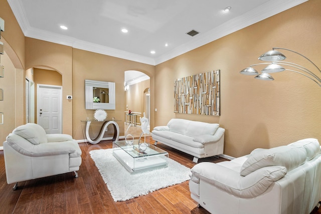 living room featuring hardwood / wood-style floors and ornamental molding