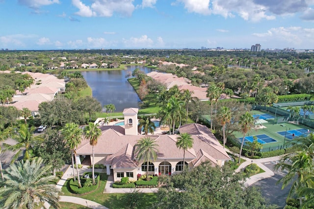 birds eye view of property with a water view