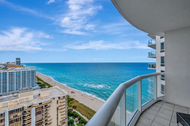 aerial view with a view of the beach and a water view