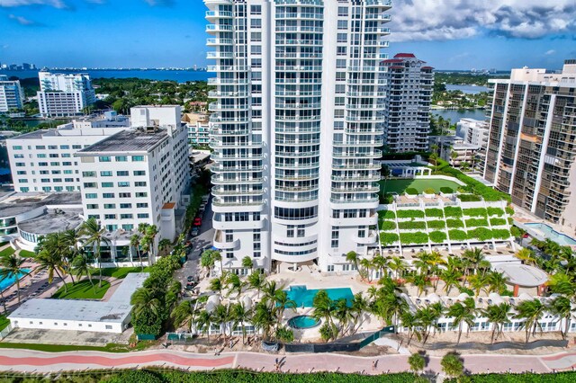 balcony with a beach view and a water view