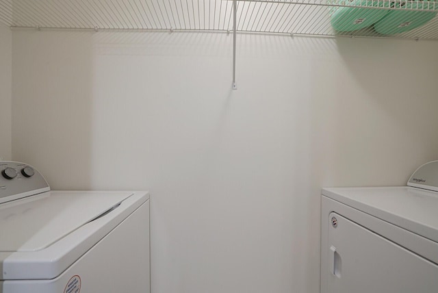 laundry area featuring separate washer and dryer