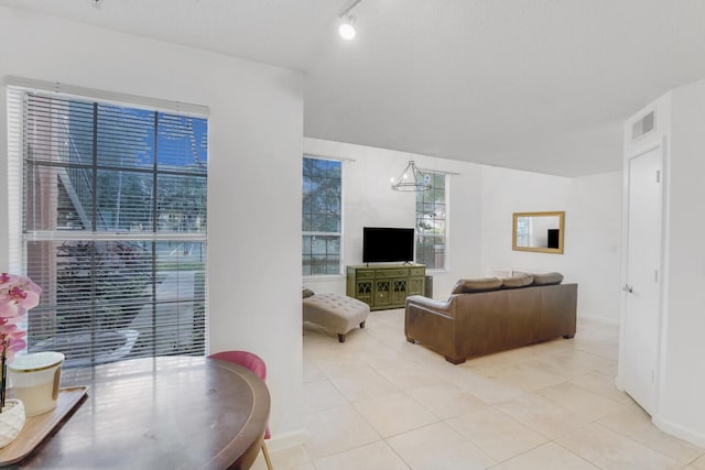 living room featuring light tile patterned floors