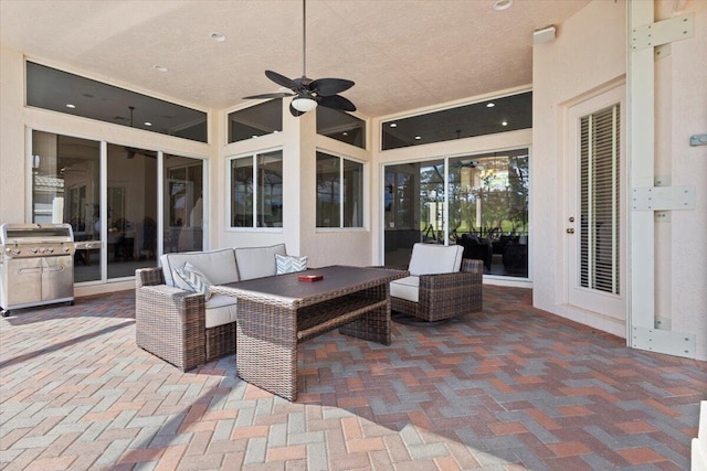 view of patio / terrace featuring outdoor lounge area, grilling area, and ceiling fan