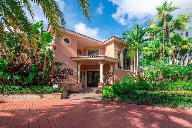 mediterranean / spanish house with french doors