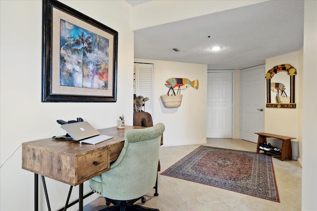 office featuring a textured ceiling