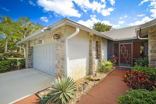 property entrance with a garage